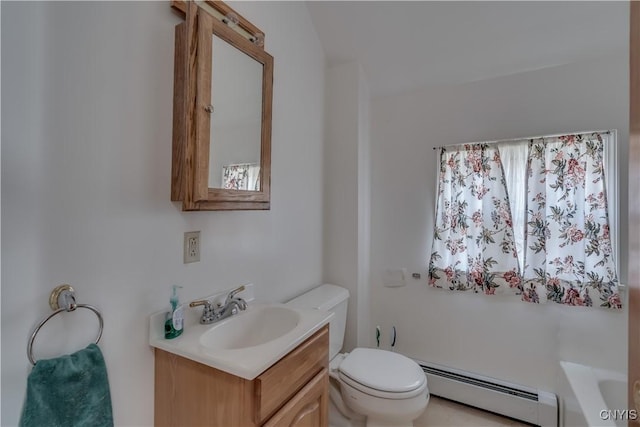 427 S James St, Wilna, NY 13619 - bathroom featuring vanity, a baseboard heating unit, and toilet