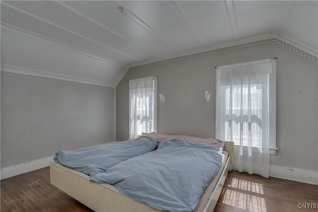 427 S James St, Wilna, NY 13619 - bedroom with baseboards, ornamental molding, vaulted ceiling, and wood finished floors