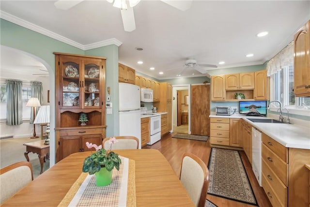 dining area featuring recessed lighting, arched walkways, ceiling fan, and ornamental molding