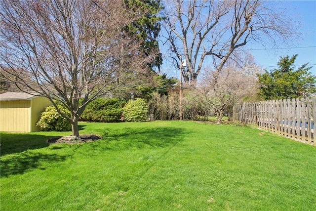 view of yard with fence
