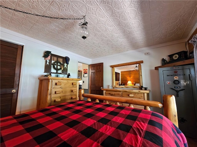 bedroom with an ornate ceiling