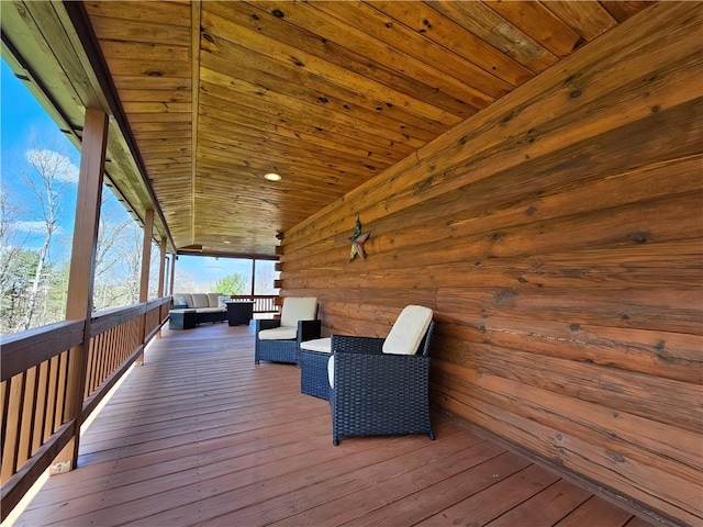 deck featuring outdoor lounge area