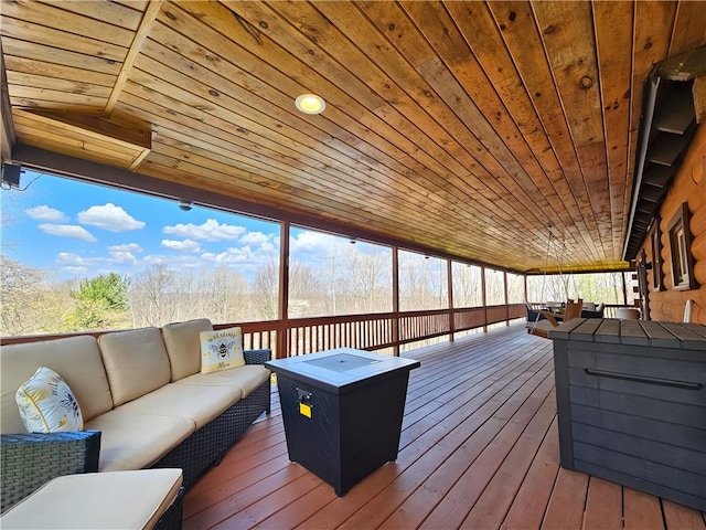 deck with an outdoor hangout area