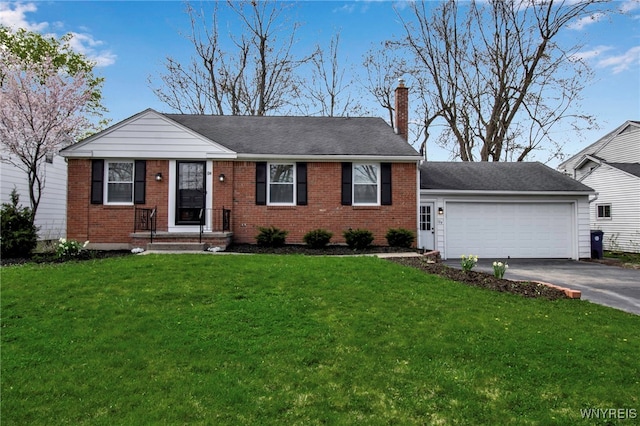 ranch-style home with a chimney, an attached garage, brick siding, and aphalt driveway