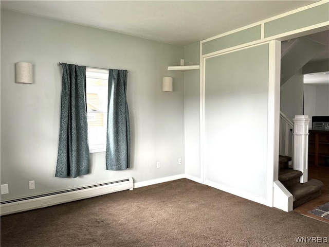 interior space featuring a baseboard radiator, carpet, and stairs