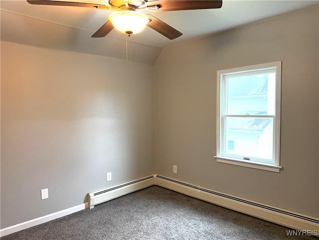 spare room with carpet floors, a baseboard radiator, ceiling fan, and a wealth of natural light