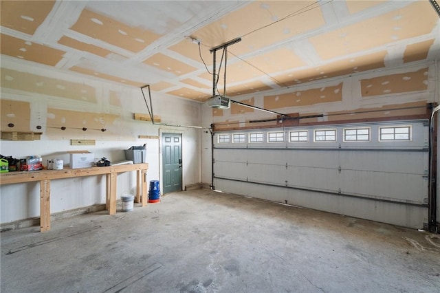 3300 County Road 7, Hector, NY 14865 - garage featuring a garage door opener
