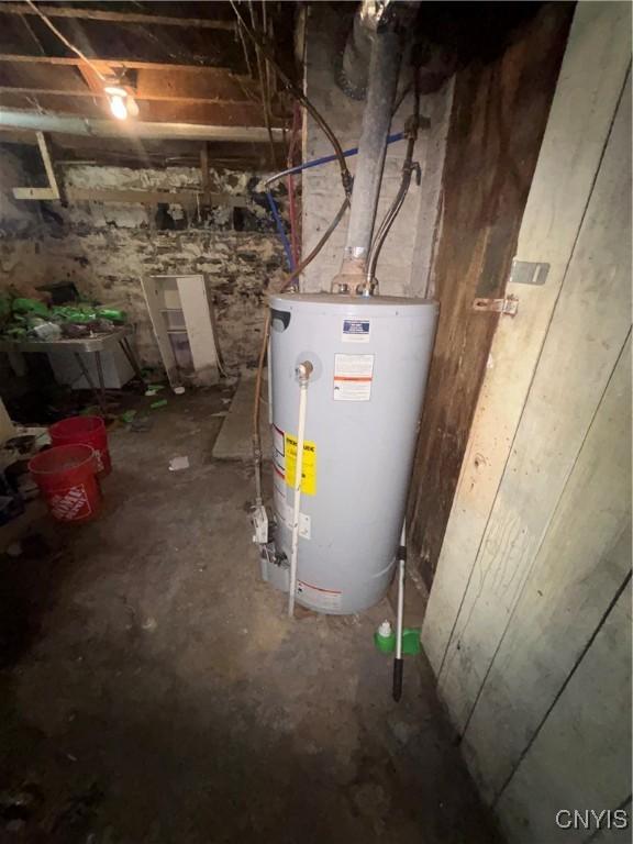 111 N Fulton St, Auburn, NY 13021 - utility room featuring water heater