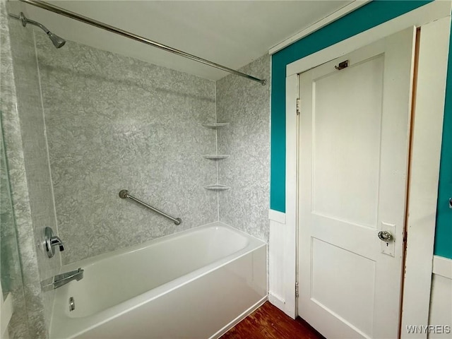 bathroom with wood finished floors and shower / bathing tub combination