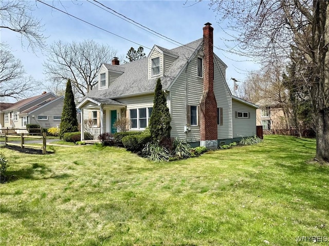 view of property exterior featuring a lawn, a shingled roof, and a chimney