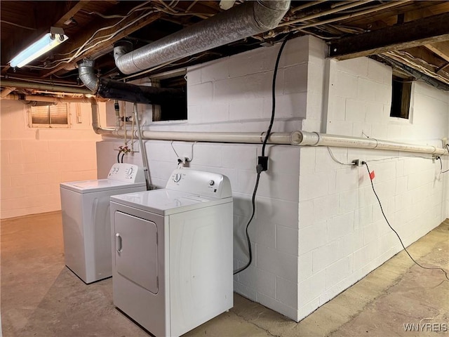 laundry area with laundry area and separate washer and dryer