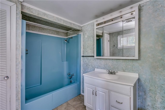 11931 State Route 12e, Lyme, NY 13622 - bathroom featuring bathtub / shower combination, vanity, a closet, tile patterned floors, and ornamental molding
