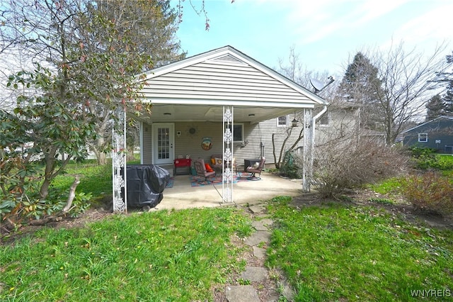 rear view of house featuring a patio
