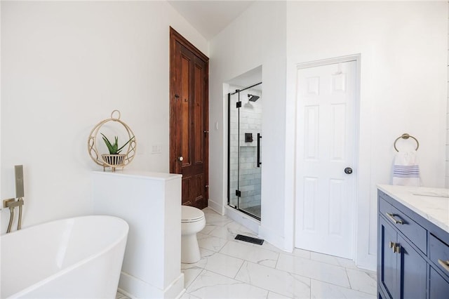full bath featuring a freestanding bath, a shower stall, toilet, and marble finish floor