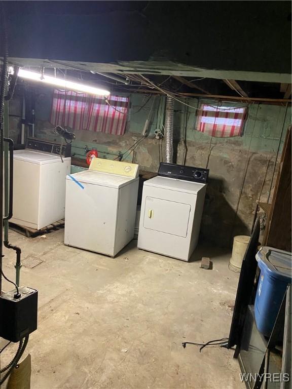 unfinished basement with separate washer and dryer