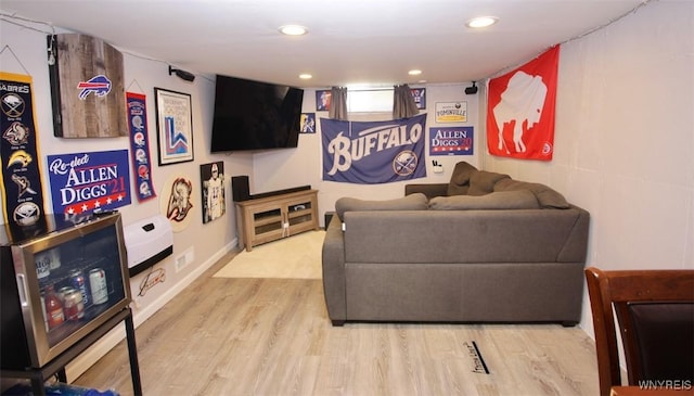 living area featuring recessed lighting and wood finished floors