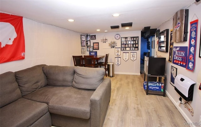 living room featuring recessed lighting and light wood-type flooring
