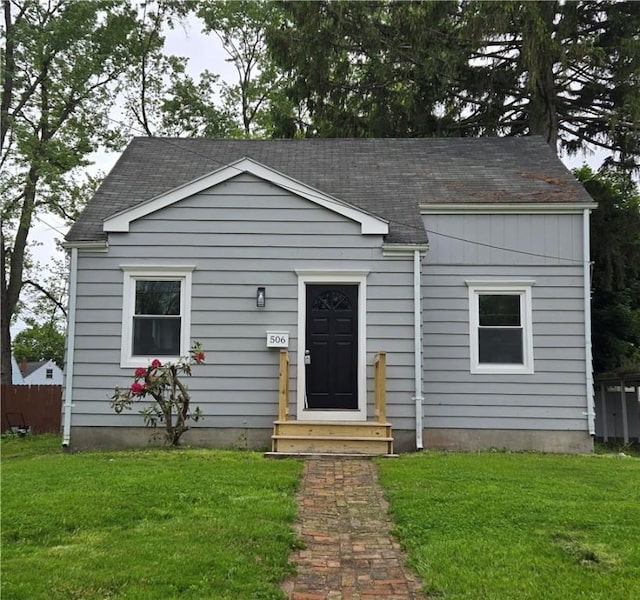 506 Luce St, Elmira-City, NY 14904 - bungalow with a front yard and roof with shingles