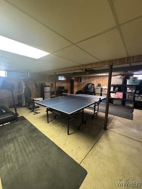 game room featuring concrete flooring