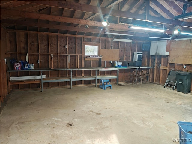 garage with a workshop area