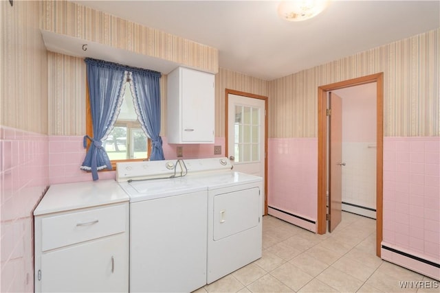 laundry room featuring separate washer and dryer, wallpapered walls, tile walls, and a baseboard radiator