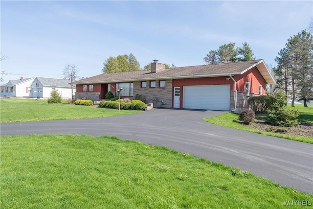 ranch-style house with a chimney, a garage, driveway, and stone siding