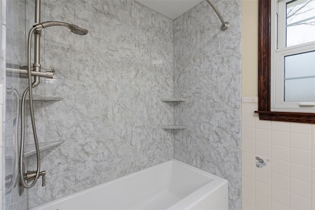 full bath featuring  shower combination