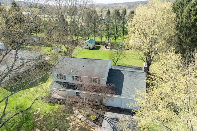 aerial view with a wooded view