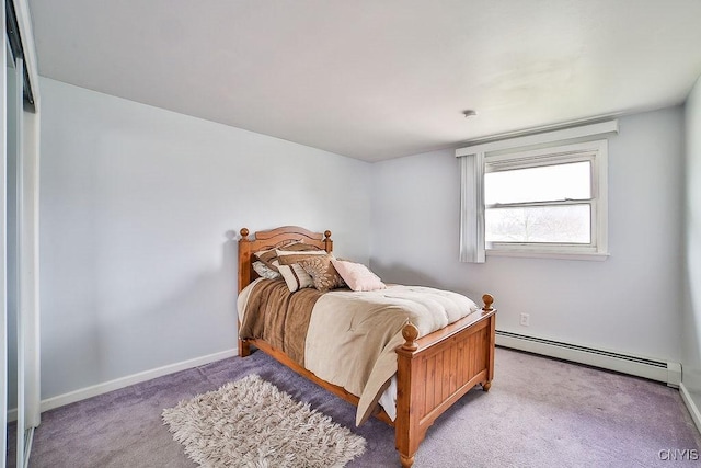 22 Plaza Dr, Amherst, NY 14221 - carpeted bedroom featuring baseboards and a baseboard radiator