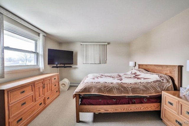 22 Plaza Dr, Amherst, NY 14221 - bedroom featuring light carpet and a baseboard heating unit