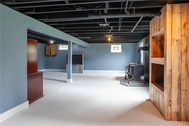 below grade area featuring a wood stove
