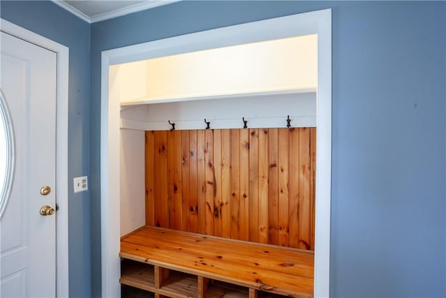 mudroom featuring ornamental molding