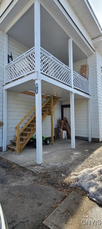 view of home's exterior with stairs