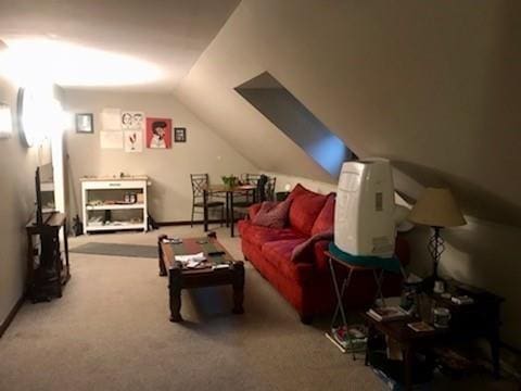 interior space featuring carpet flooring and lofted ceiling