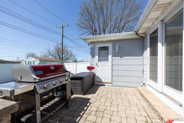 view of patio / terrace featuring fence