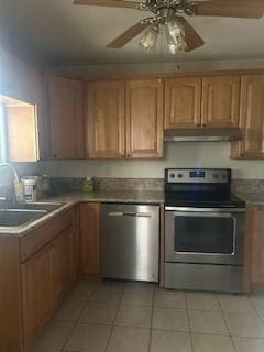 250 Schuyler Ave, Elmira-City, NY 14904 - kitchen with stainless steel appliances, under cabinet range hood, light tile patterned flooring, and a ceiling fan