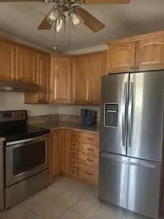 250 Schuyler Ave, Elmira-City, NY 14904 - kitchen featuring appliances with stainless steel finishes, under cabinet range hood, light tile patterned floors, and ceiling fan