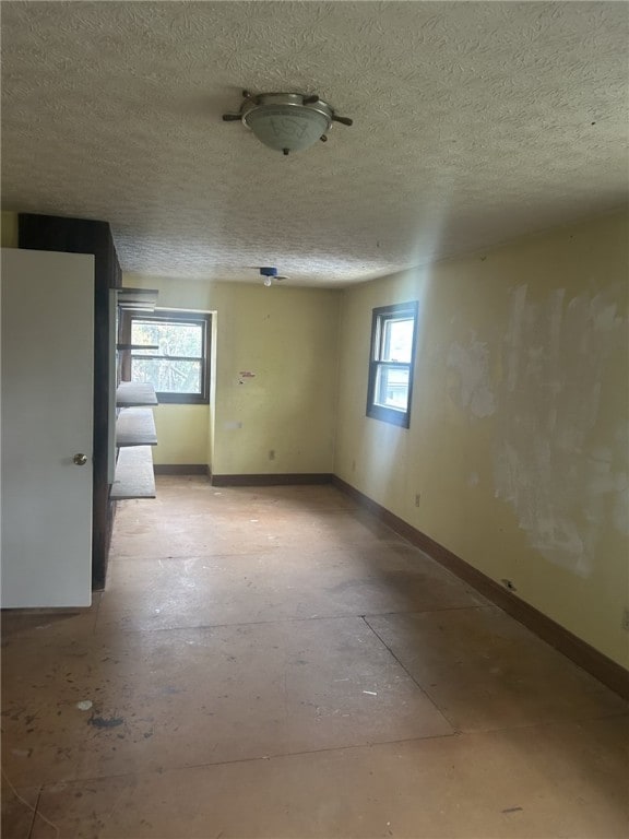 250 Schuyler Ave, Elmira-City, NY 14904 - unfurnished room with a textured ceiling