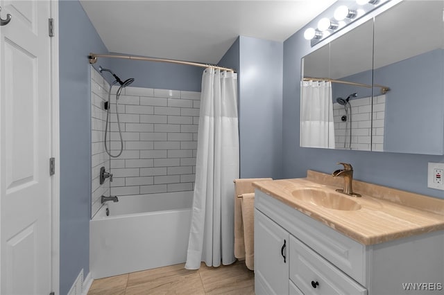 bathroom with vanity and shower / bathtub combination with curtain