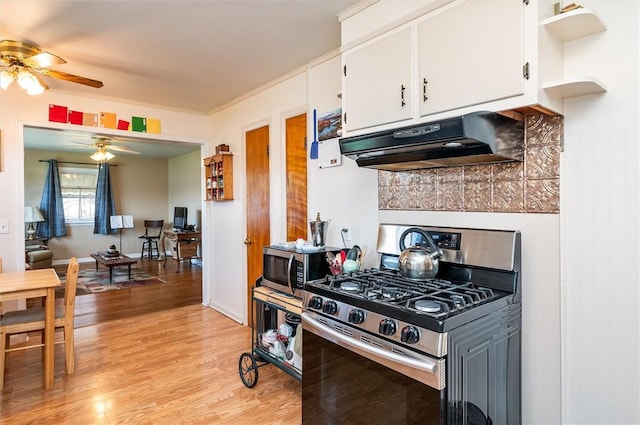 kitchen featuring a ceiling fan, appliances with stainless steel finishes, open shelves, white cabinets, and under cabinet range hood