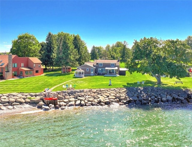 view of yard with a water view