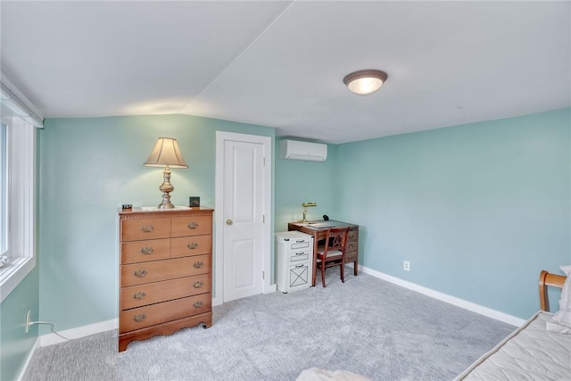 carpeted bedroom with baseboards, a wall mounted AC, and vaulted ceiling