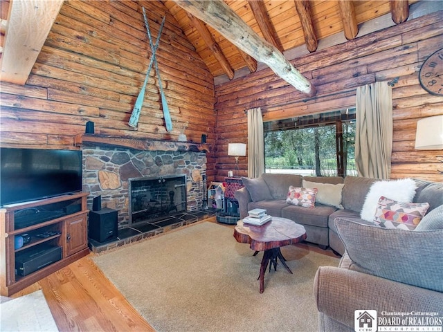 living room with beamed ceiling, wood ceiling, light wood finished floors, and log walls