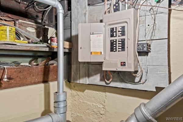 utility room featuring electric panel