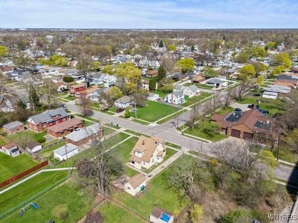 birds eye view of property with a residential view