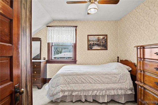 404 72nd St, Niagara Falls, NY 14304 - carpeted bedroom with wallpapered walls, vaulted ceiling, and a ceiling fan