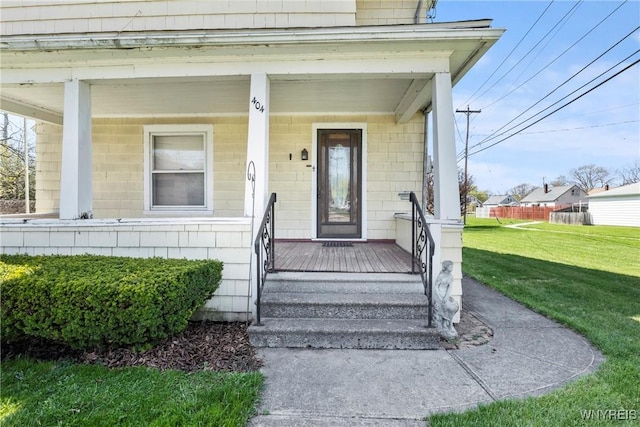 404 72nd St, Niagara Falls, NY 14304 - entrance to property with a porch and a yard