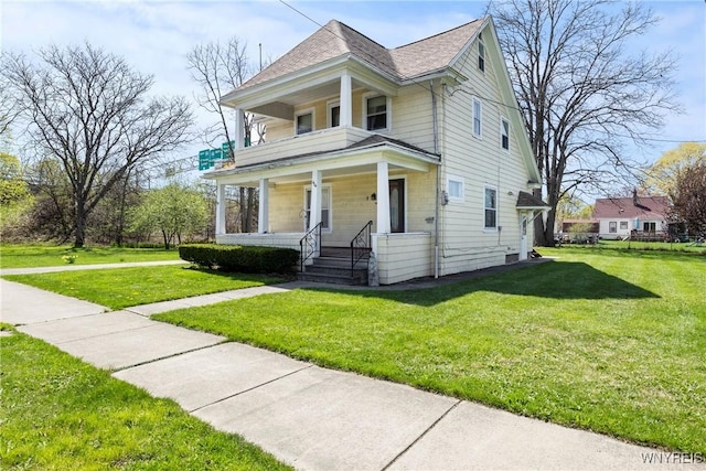 404 72nd St, Niagara Falls, NY 14304 - view of front of house featuring a porch, a front yard, roof with shingles, and a balcony