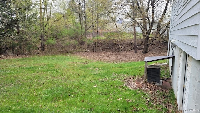 view of yard featuring central AC unit