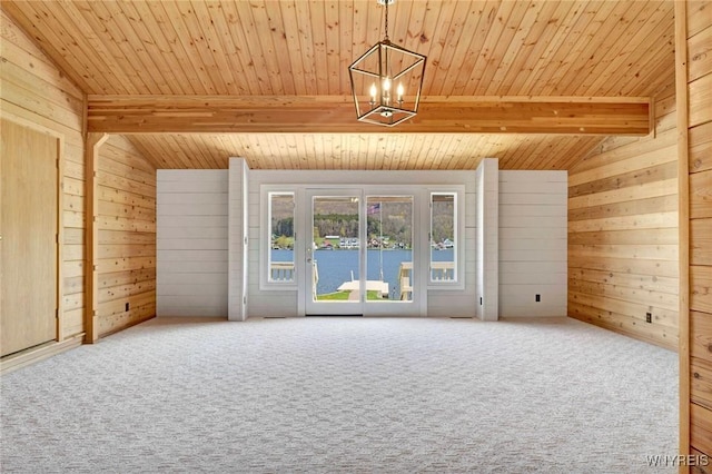 256 W Shore Rd, Cuba, NY 14727 - spare room with carpet flooring, a chandelier, wood walls, and vaulted ceiling with beams